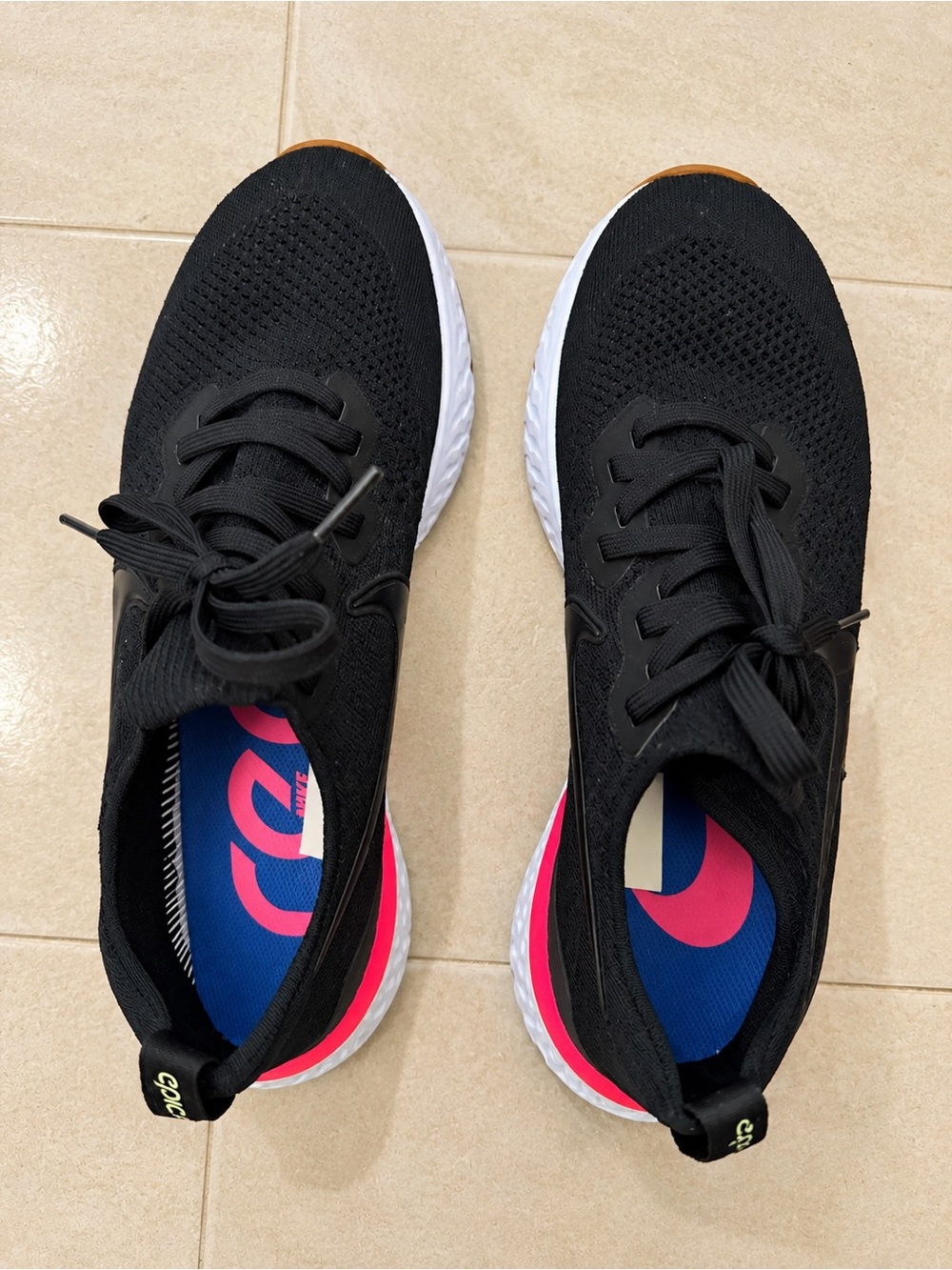 Nike Women's Black Knit Running Shoes with Pink and Blue Accents